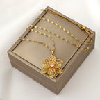 Halskæde vedhæng med smuk roterende blomst mod stress