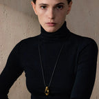 Halskæde med dråbeformet vedhæng i boheme-stil guld