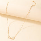 Halskjede med uendelighetssymbol anheng for kvinner i gull