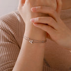 Armband med dubbel initial i guld och silver 