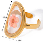 Velký prsten s květinou v průhledném rámečku